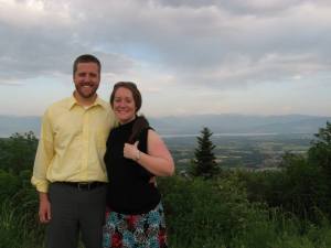 Happy couple overlooking Geneva and Mount Blanche from France