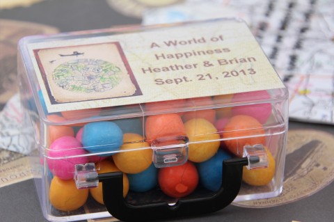 Adorable little trunks with candy as the favors!