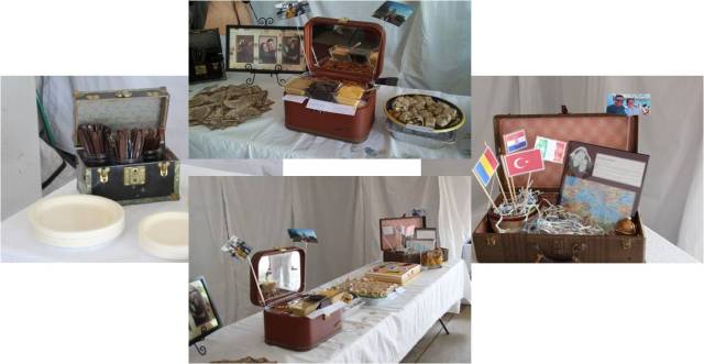 The food was adorable--little trunks holding the utensils, pretzels with several dipping sauces and some travel trinkets like an ornament and scrapbook page. Also some of our engagement pictures frames with a map matting.