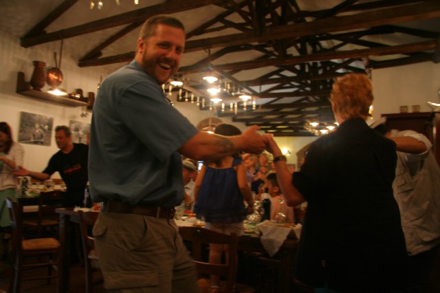 Husband getting dragged into the dance circle