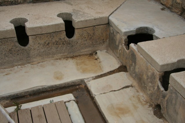 The public toilets where you sat for your business next to your neighbor, were given a stick with a sponge on the end, you dipped the sponge in the trough of water running in front of you, and then you cleaned up before tossing the sponge!